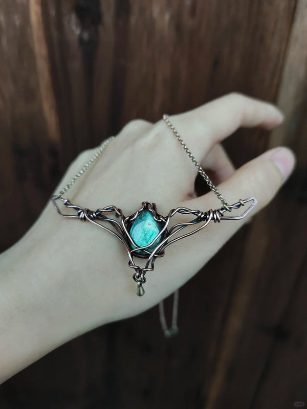 Labradorite crystal in copper art wire wrap pendant